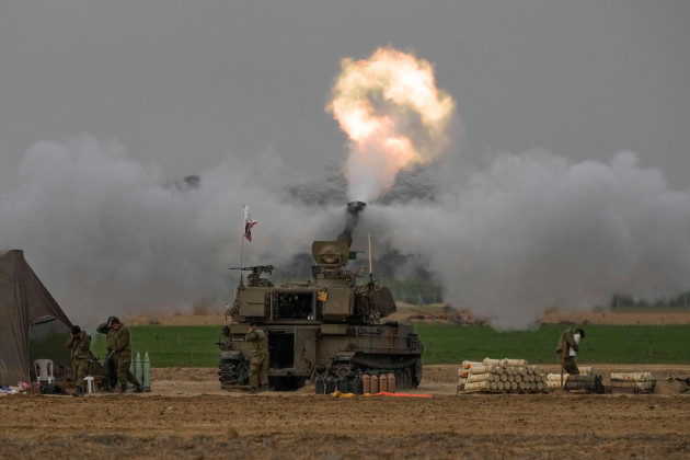 an-israeli-mobile-artillery-unit-fires-a-shell-from-southern-israel-towards-the-gaza-strip-in-a-position-near-the-israel-gaza-border-on-sunday-dec-10-2023-ap-photoleo-correa
