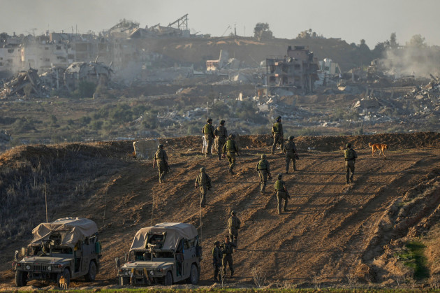 israeli-troops-are-seen-near-the-gaza-strip-border-in-southern-israel-monday-dec-11-2023-the-army-is-battling-palestinian-militants-across-gaza-in-the-war-ignited-by-hamas-oct-7-attack-into-is