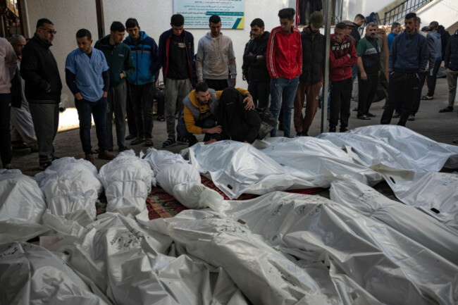 palestinians-mourn-their-relatives-killed-in-the-israeli-bombardment-of-the-gaza-strip-at-the-hospital-rafah-gaza-tuesday-dec-12-2023-ap-photofatima-shbair