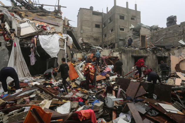 palestinians-salvage-their-belongings-after-an-israeli-strike-in-rafah-gaza-strip-on-wednesday-dec-13-2023-ap-photohatem-ali