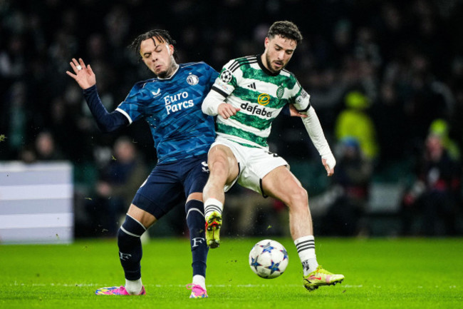 glasgow-uk-13th-dec-2023-glasgow-quilindschy-hartman-of-feyenoord-mikey-johnston-of-celtic-during-the-6th-leg-of-the-uefa-champions-league-group-stage-between-celtic-v-feyenoord-at-celtic-park