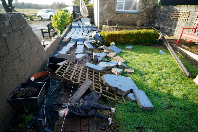 a-fallen-wall-and-damage-to-the-rear-of-a-property-in-leitrim-village-in-co-leitrim-after-a-tornado-and-high-winds-on-sunday-flattened-trees-ripped-a-roof-off-a-building-and-left-debris-scattered-on