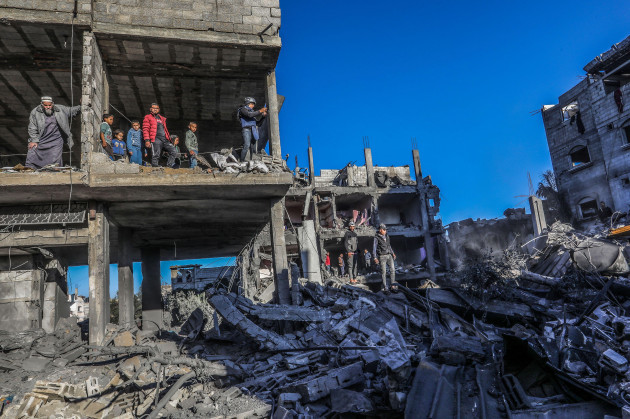 15-december-2023-palestinian-territories-rafah-palestinians-inspect-damages-after-an-israeli-air-strike-on-a-house-belonging-to-the-al-arja-family-in-the-city-of-rafah-in-the-southern-gaza-strip-p