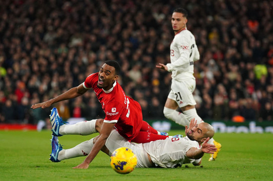 liverpools-ryan-gravenberch-top-and-manchester-uniteds-sofyan-amrabat-battle-for-the-ball-during-the-premier-league-match-at-anfield-liverpool-picture-date-sunday-december-17-2023