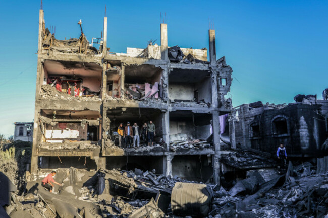 15-december-2023-palestinian-territories-rafah-palestinians-inspect-damages-after-an-israeli-air-strike-on-a-house-belonging-to-the-al-arja-family-in-the-city-of-rafah-in-the-southern-gaza-strip-p