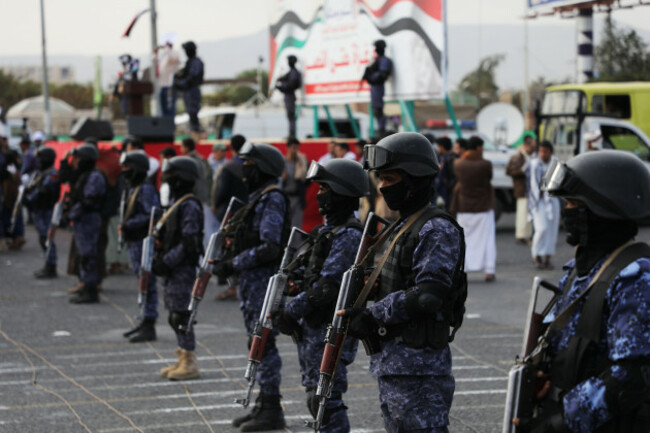 december-15-2023-sanaa-sanaa-yemen-yemens-houthi-affiliated-security-forces-stand-guard-during-a-march-in-solidarity-with-the-people-of-gaza-in-the-capital-sanaa-the-houthis-who-are-aligned-wi
