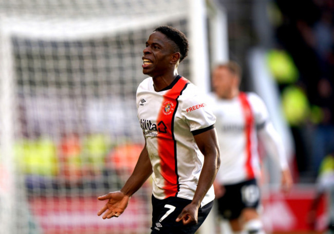 luton-towns-chiedozie-ogbene-celebrates-after-team-mate-elijah-adebayo-not-pictured-scores-their-sides-second-goal-of-the-game-during-the-premier-league-match-at-the-city-ground-nottingham-pictu