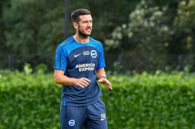 swansea-wales-7-october-2023-gary-dicker-brighton-hove-albion-professional-development-phase-coach-during-the-pre-match-warm-up-before-the-premier-league-cup-game-between-swansea-city-under-21-an