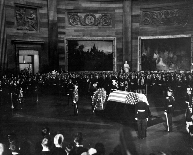 president-lyndon-b-johnson-placing-a-wreath-before-the-flag-draped-casket-of-president-kennedy-during-funeral-services-held-in-the-united-states-capitol-rotunda-november-24-1963