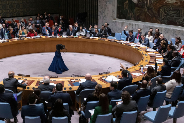 representatives-of-member-countries-take-vote-during-the-security-council-meeting-at-united-nations-headquarters-friday-dec-22-2023-after-many-delays-the-u-n-security-council-adopted-a-watered