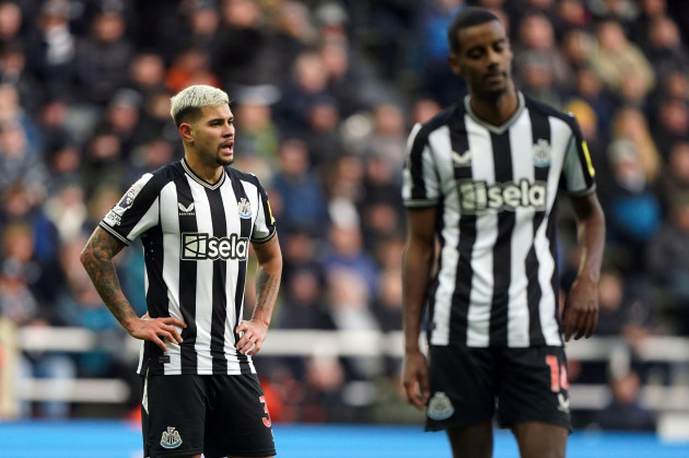 newcastle-uniteds-bruno-guimaraes-left-and-alexander-isak-stand-dejected-during-the-premier-league-match-at-st-james-park-newcastle-upon-tyne-picture-date-tuesday-december-26-2023