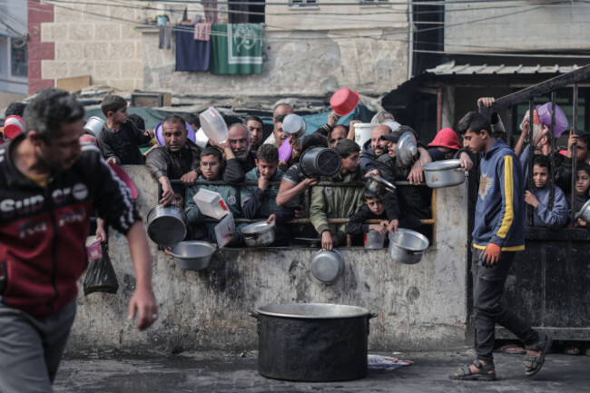 palestinians-wait-to-collect-food-at-a-donation-point-in-a-refugee-camp-in-rafah-in-the-southern-gaza-strip-palestinians-wait-to-collect-food-at-a-donation-point-in-a-refugee-camp-in-rafah-in-the-sout