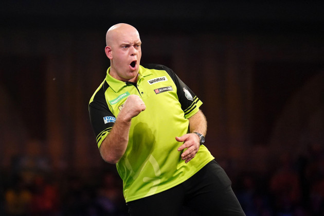 michael-van-gerwen-in-action-against-stephen-bunting-not-pictured-on-day-twelve-of-the-paddy-power-world-darts-championship-at-alexandra-palace-london-picture-date-friday-december-29-2023