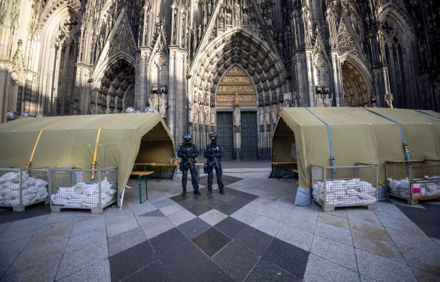 before-the-end-of-year-pontifical-mass-in-cologne-cathedral-with-cardinal-woelki-the-area-around-the-cathedral-is-heavily-guarded-by-police-with-machine-guns-sunday-dec-31-2023-german-authoritie
