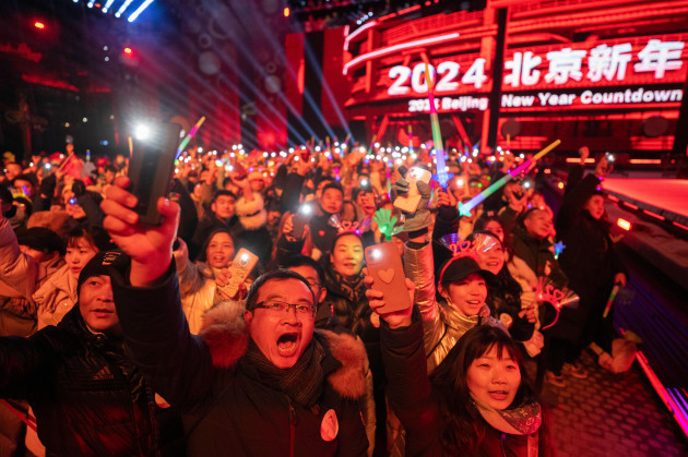 revelers-cheer-before-a-countdown-to-the-new-year-in-beijing-sunday-dec-31-2023-ap-photong-han-guan