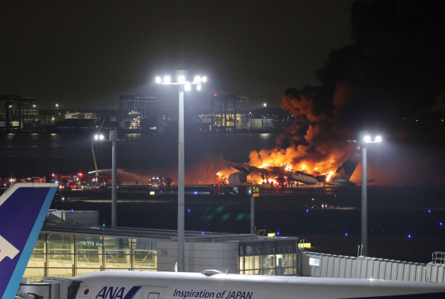 a-japan-airlines-plane-catches-fire-on-the-runway-at-haneda-airport-in-ota-ward-tokyo-on-jan-2nd-2024-firefighting-efforts-are-underway-the-fire-started-on-the-aircraft-just-as-it-landed-haneda-a