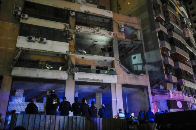 people-search-for-survivors-top-inside-an-apartment-following-a-massive-explosion-in-the-southern-suburb-of-beirut-lebanon-tuesday-jan-2-2024-ap-photohassan-ammar