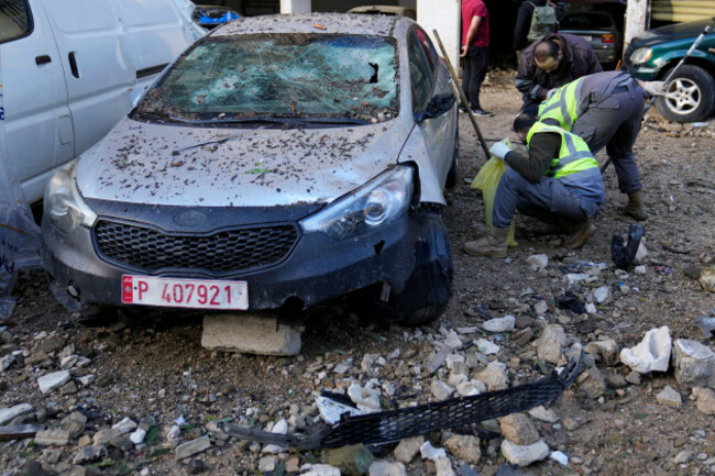 hezbollah-civil-defense-workers-search-for-body-remains-near-an-apartment-building-where-an-apparent-israeli-strike-tuesday-killed-top-hamas-political-leader-saleh-arouri-in-the-southern-suburb-of-b