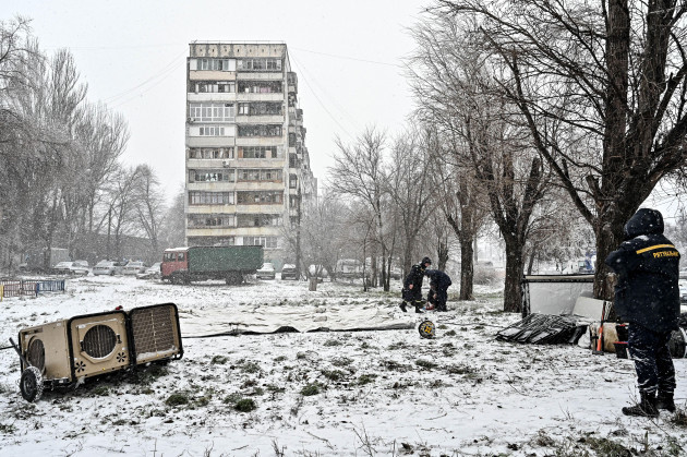 zaporizhzhia-ukraine-08th-jan-2024-zaporizhzhia-ukraine-january-8-2024-rescuers-are-seen-at-work-near-a-residential-building-damaged-as-a-result-of-the-russian-missile-attack-on-zaporizhzhia