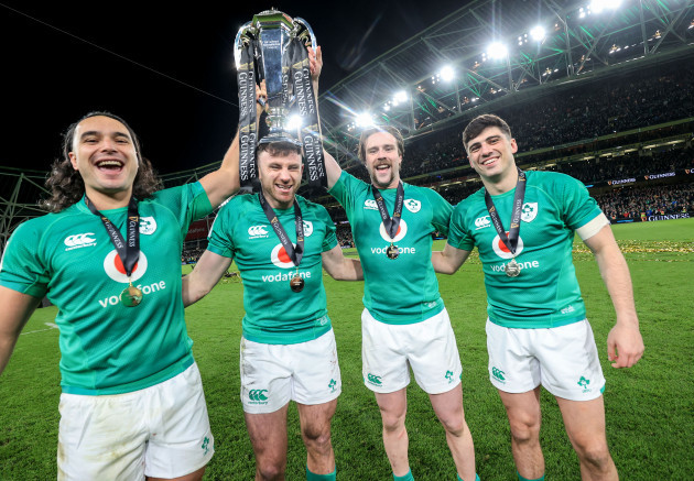 james-lowe-hugo-keenan-mack-hansen-and-jimmy-obrien-celebrate-with-the-guinness-six-nations-championship-trophy