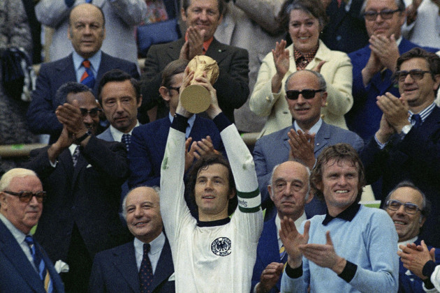 file-in-this-july-7-1974-file-photo-west-germany-captain-franz-beckenbauer-holds-up-the-world-cup-trophy-after-his-team-defeated-the-netherlands-by-2-1-in-the-world-cup-soccer-final-at-munichs