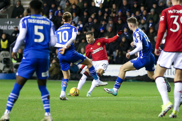 wigan-uk-08th-jan-2024-diogo-dalot-of-manchester-united-c-shoots-and-scores-his-teams-1st-goal-emirates-fa-cup-3rd-round-match-wigan-athletic-v-manchester-utd-at-the-dw-stadium-in-wigan-lanc