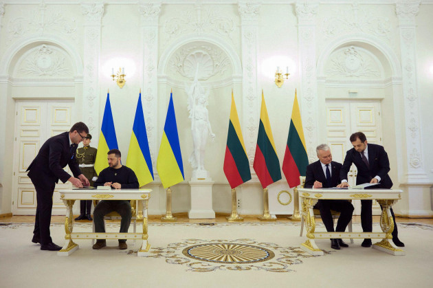 in-this-photo-provided-by-the-ukrainian-presidential-press-office-ukraines-president-volodymyr-zelenskyy-left-attends-the-signing-ceremony-of-a-joint-statement-with-lithuanias-president-gitanas-n