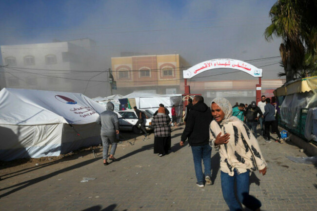 palestinians-run-on-the-al-aqsa-hospital-grounds-moments-after-an-israeli-strike-hit-a-building-next-to-it-in-deir-al-balah-gaza-strip-on-wednesday-jan-10-2023-ap-photoadel-hana