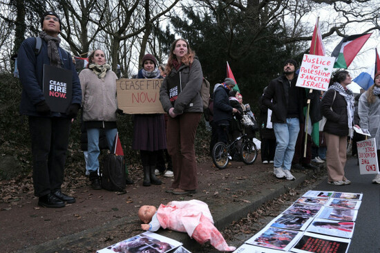 protestors-hold-signs-calling-for-a-ceasefire-during-the-opening-of-hearings-at-the-international-court-of-justice-in-the-hague-netherlands-thursday-jan-11-2024-the-united-nations-top-court-ope