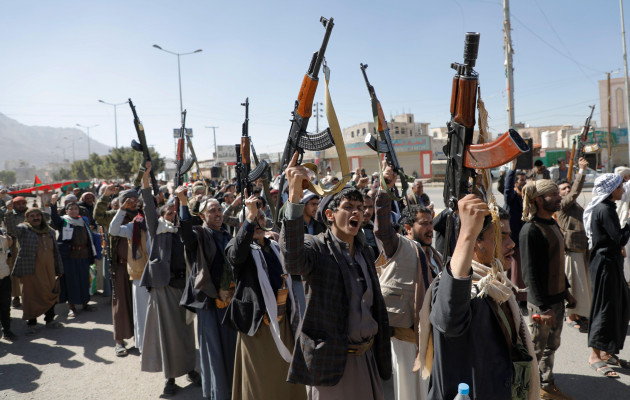 sanaa-sanaa-yemen-11th-jan-2024-newly-recruited-houthi-fighters-hold-up-a-weapons-and-chanting-slogans-in-a-ceremony-at-the-end-of-their-training-in-sanaa-yemen-the-head-of-yemens-houthi-moveme