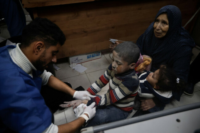 palestinians-wounded-in-an-israeli-strike-are-treated-in-a-hospital-in-kahan-younis-gaza-strip-friday-jan-12-2024-ap-photomohammed-dahman