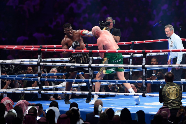tyson-fury-of-england-the-wbc-and-lineal-heavyweight-champion-center-right-fights-former-ufc-heavyweight-champion-francis-ngannou-of-cameroon-during-their-boxing-match-to-mark-the-start-of-riyad