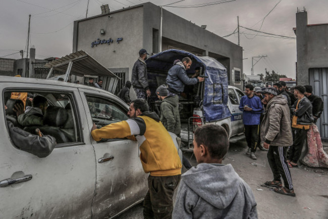 rafah-palestinian-territories-17th-jan-2024-police-secure-trucks-carrying-gas-and-humanitarian-aid-enter-the-gaza-strip-through-the-the-kerem-shalom-crossing-border-credit-abed-rahim-khatibdpa