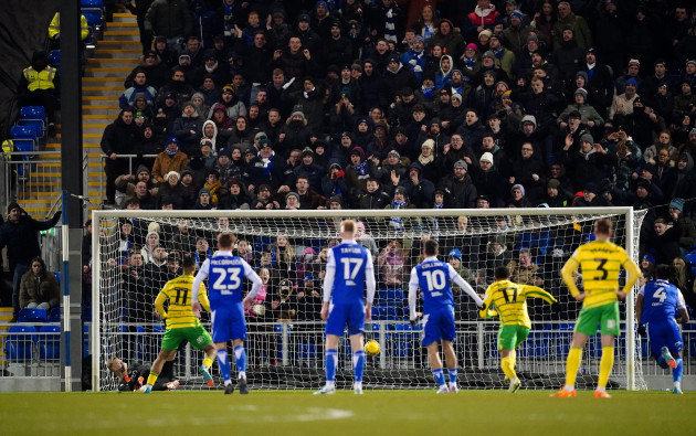 bristol-rovers-fans-watch-as-norwich-citys-adam-idah-scores-their-second-goal-from-the-penalty-spot-during-the-emirates-fa-cup-third-round-replay-at-the-memorial-stadium-bristol-picture-date-wedne