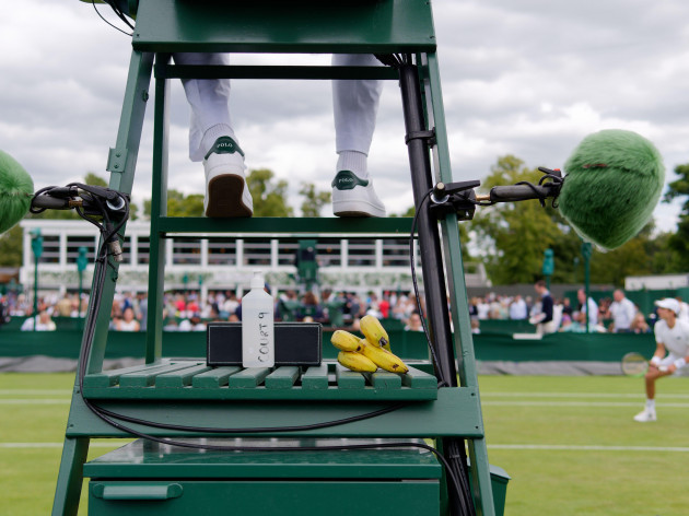 wimbledon-greater-london-england-july-02-2022-wimbledon-tennis-championship-close-up-of-an-umpire-chair-with-bananas-and-microphone