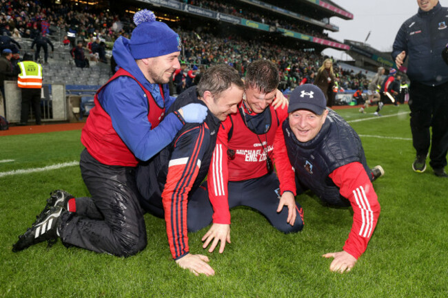 kenneth-burke-celebrates-after-the-game-with-his-backroom-staff