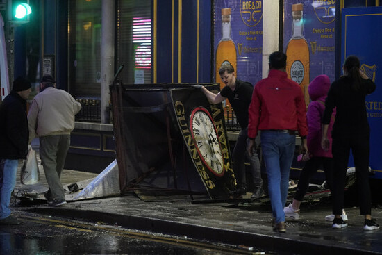 a-clock-tower-falls-to-the-ground-in-eyre-square-galway-during-storm-isha-a-status-red-wind-warning-has-been-issued-for-counties-donegal-galway-and-mayo-as-authorities-warn-people-to-take-care-ahe