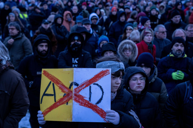 people-gather-as-they-protest-against-the-afd-party-and-right-wing-extremism-in-front-of-the-reichstag-building-in-berlin-germany-sunday-jan-21-2024-ap-photoebrahim-noroozi