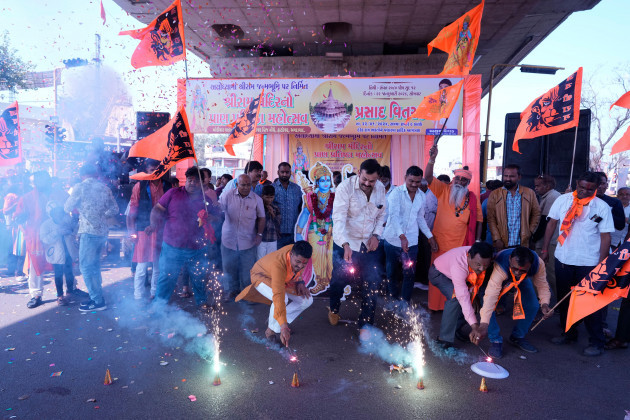 people-light-fire-crackers-in-ahmedabad-to-celebrate-opening-of-a-temple-dedicated-to-hindu-deity-lord-ram-in-ayodhya-india-monday-jan-22-2024-ap-photoajit-solanki
