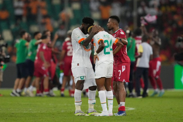 ivory-coasts-franck-kessie-left-comforts-his-teammate-simon-adingra-after-losing-the-african-cup-of-nations-group-a-soccer-match-against-equatorial-guinea-at-the-olympic-stadium-of-ebimpe-in-abidj