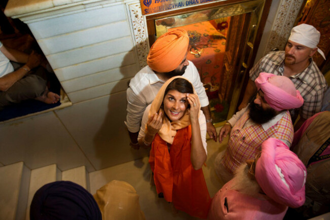 u-s-ambassador-to-the-united-nations-nikki-haley-center-leaves-after-praying-at-the-gurdwara-sis-ganj-sahib-a-sikh-temple-in-new-delhi-india-thursday-june-28-2018-nikki-haley-offered-inter-f