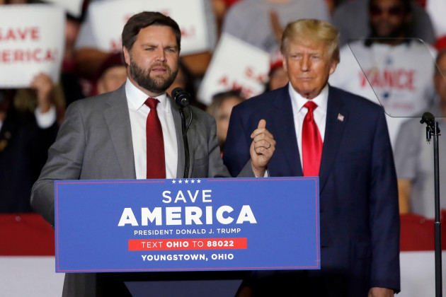 jd-vance-republican-candidate-for-u-s-senator-for-ohio-is-accompanied-by-former-president-donald-trump-as-he-speaks-at-a-campaign-rally-in-youngstown-ohio-saturday-sept-17-2022-ap-phototom