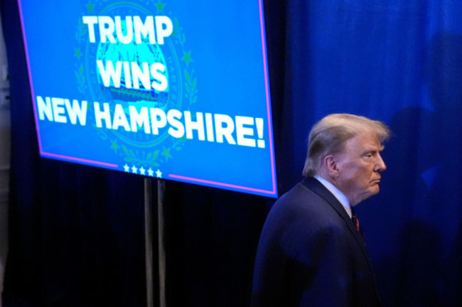 republican-presidential-candidate-former-president-donald-trump-walks-backstage-after-speaking-at-a-primary-election-night-party-in-nashua-n-h-tuesday-jan-23-2024-voter-fraud-was-one-thing-trum