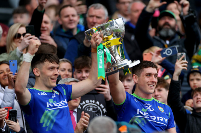 david-clifford-and-joe-oconnor-lift-the-trophy