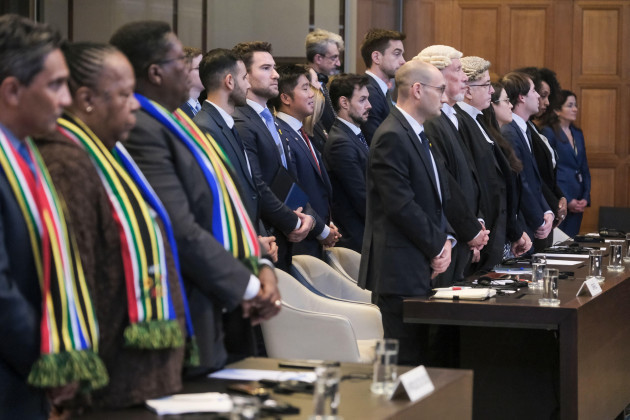 south-african-left-and-israels-delegation-right-stand-during-session-at-the-international-court-of-justice-or-world-court-in-the-hague-netherlands-friday-jan-26-2024-israel-is-set-to-hear