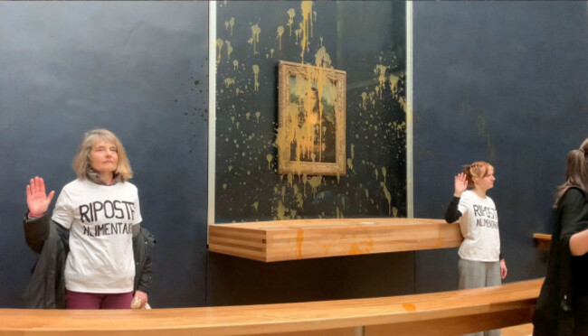 paris-france-28th-jan-2024-a-screen-grab-captured-from-a-video-shows-two-environmental-activists-from-the-collective-dubbed-riposte-alimentaire-food-retaliation-after-throwing-soup-at-leonardo