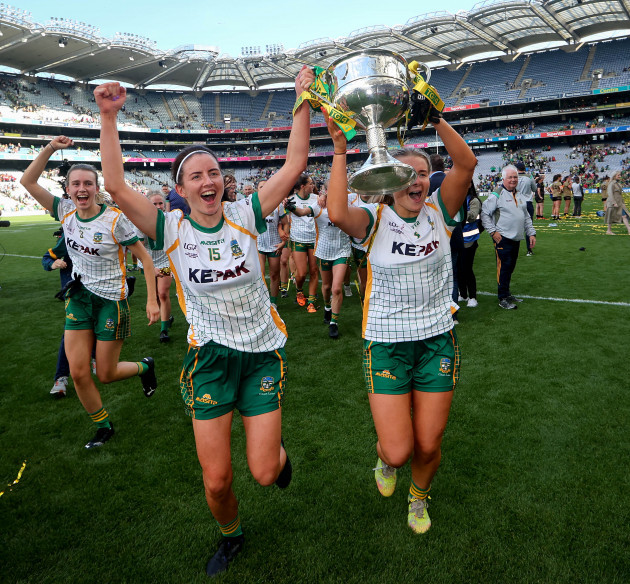 niamh-osullivan-and-katie-newe-celebrate-with-the-brendan-martin-cup-after-the-game
