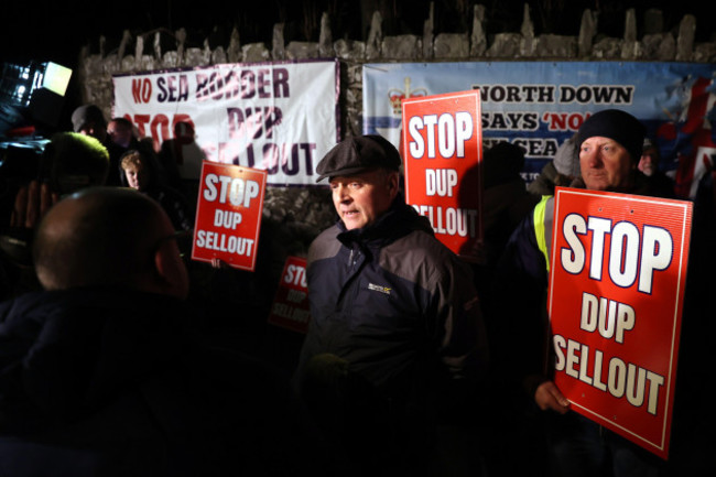 mel-lucas-from-traditional-unionist-voice-speaks-to-the-media-as-he-joins-protesters-outside-larchfield-estate-where-the-dup-are-holding-a-private-party-meeting-the-protesters-are-calling-for-the-d