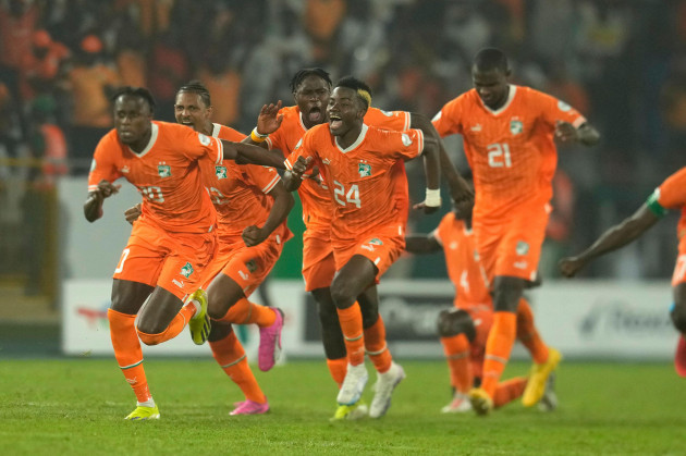 ivory-coast-players-celebrate-after-defeating-senegal-in-a-penalty-shootout-during-their-african-cup-of-nations-round-of-16-soccer-match-between-senegal-and-ivory-coast-at-the-charles-konan-banny-sta