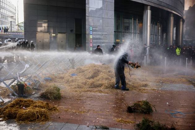file-anti-riot-police-use-water-to-disperse-people-during-a-protest-by-farmers-outside-the-european-parliament-as-european-leaders-meet-for-an-eu-summit-in-brussels-thursday-feb-1-2024-ap-phot